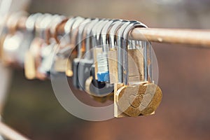 Heart shape love locks on bridge. Padlocks as symbol love and affection