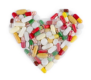 Heart shape made from medicine capsules, pills and tablets