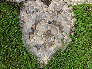 Heart shape made of pebble stones