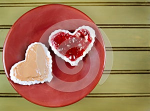 Heart shape peanut butter and jelly sandwtich