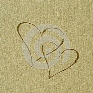 Heart shape on the sand surface