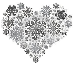 Heart shape from silver snowflakes on white