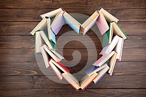 Heart shape stacked of books - love to wisdom, science and education concept