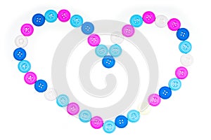 Heart shape of their multi-colored buttons on a white background