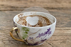 Heart shape in Turkish coffee grounds in cup for fortune telling