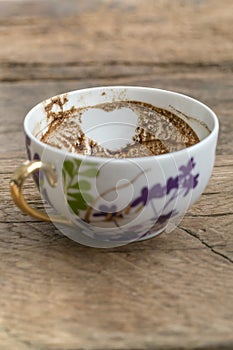 Heart shape in Turkish coffee grounds in cup for fortune telling