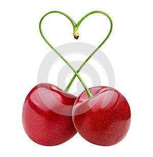 Heart shape from two cherries over white
