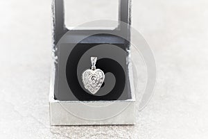 Heart shape white gold locket