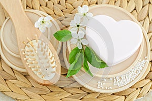 Heart shaped bar of soap (solid shampoo), wooden hairbrush. Eco friendly toiletries. Natural beauty treatment, skin care