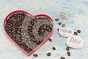 Heart shaped box filled with coffee beans