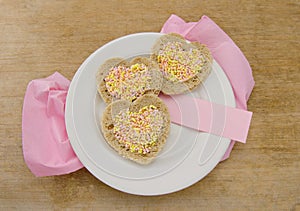 Heart shaped bread with sprinkles