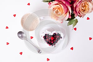 Heart shaped cake decorated with red currant