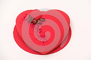 Heart shaped cake. Luxury mousse cake decorated with roses. Valentine`s Day celebration