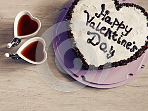 Heart-shaped cake for St. Valentine`s Day