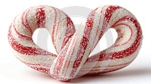 Heart-shaped candy cane swirls on white photo