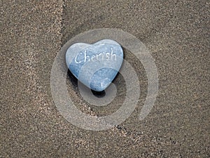 Heart-shaped Cherish Stone On Sand