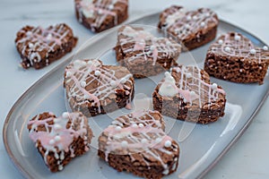 Heart shaped chocolate brownie cake with icing for Valentines Day