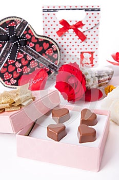 Heart Shaped Chocolate Love in pink gift box and Roses Valentines Day