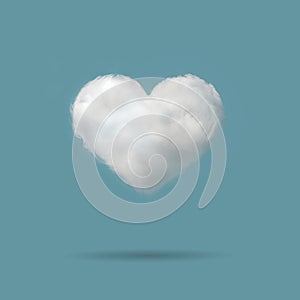 Heart shaped cloud in the blue  backgroud with space for text, valentines day background