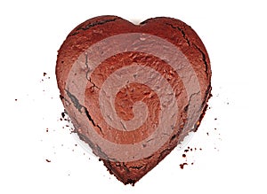 Heart shaped cocoa sponge cake base on white background photo