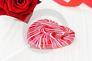 Heart shaped colored lollipop. Valentine's Day.