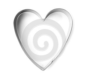 Heart shaped cookie cutter on white background