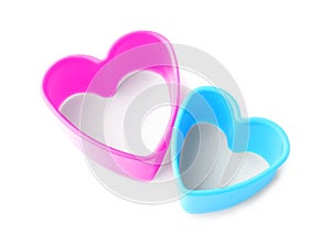 Heart shaped cookie cutters on white