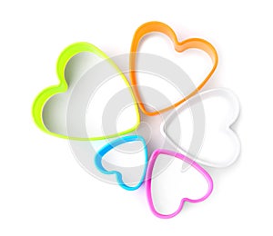 Heart shaped cookie cutters on white background