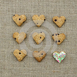 Heart shaped cookies on burlap fabric