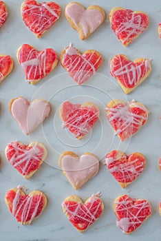 Heart shaped cookies with pink and white icing