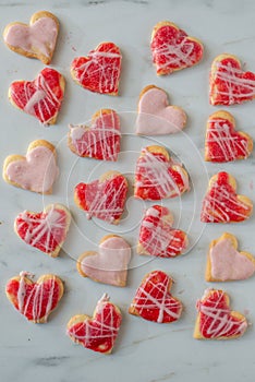 Heart shaped cookies with pink and white icing