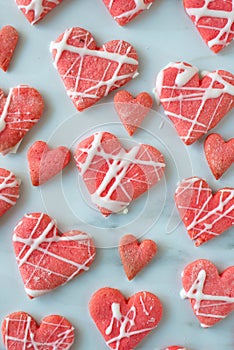 Heart shaped cookies with pink and white icing