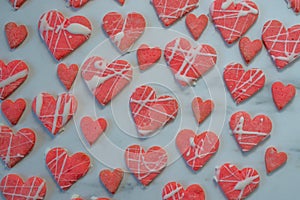 Heart shaped cookies with pink and white icing