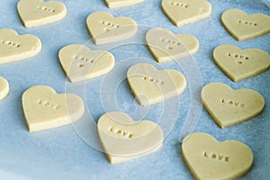 Heart-shaped cookies ready to bake. Pastry Concept