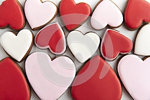 Heart shaped cookies with red  pink and white sugar icing. Close up. Macro. Valentines day treat
