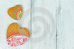 Heart shaped cookies for valentine day on wooden table. Top view, copy space