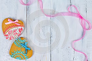 Heart shaped cookies for valentine day on wooden table. Top view, copy space