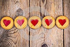 Heart shaped cookies on wooden table