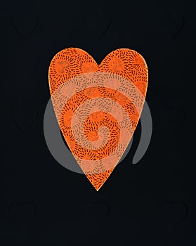 A heart shaped frame with little heart patterns inside it.