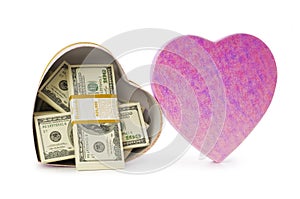 Heart shaped gift box and dollars