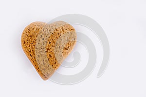 Heart shaped gingerbread, gray/white background. Valentines day symbol