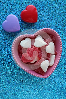 Heart shaped gummy candy in bowl plastic hearts