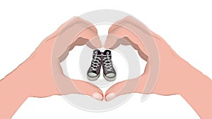 Heart-shaped hands and used and lived-in sneakers