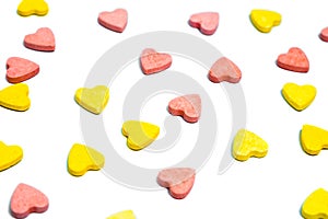 Heart shaped healthcare pills on white background