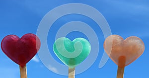 Heart shaped ice in front of the summer sky