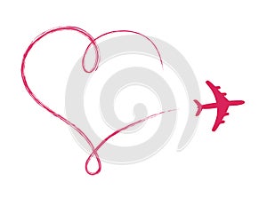 Heart shaped icon in air, made by plane