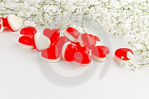 Heart shaped jelly gummies on white. Copy space. Love and romance