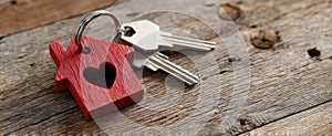 The heart-shaped keychain and keys on a rustic wooden surface AI generated image
