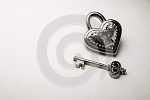 heart shaped lock with key black and white Valentine's Day romance love relationship themed photo