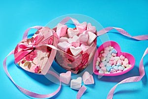 Heart shaped marshmallows and candies in gift box